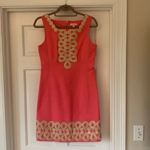 Pink and gold shift dress.
